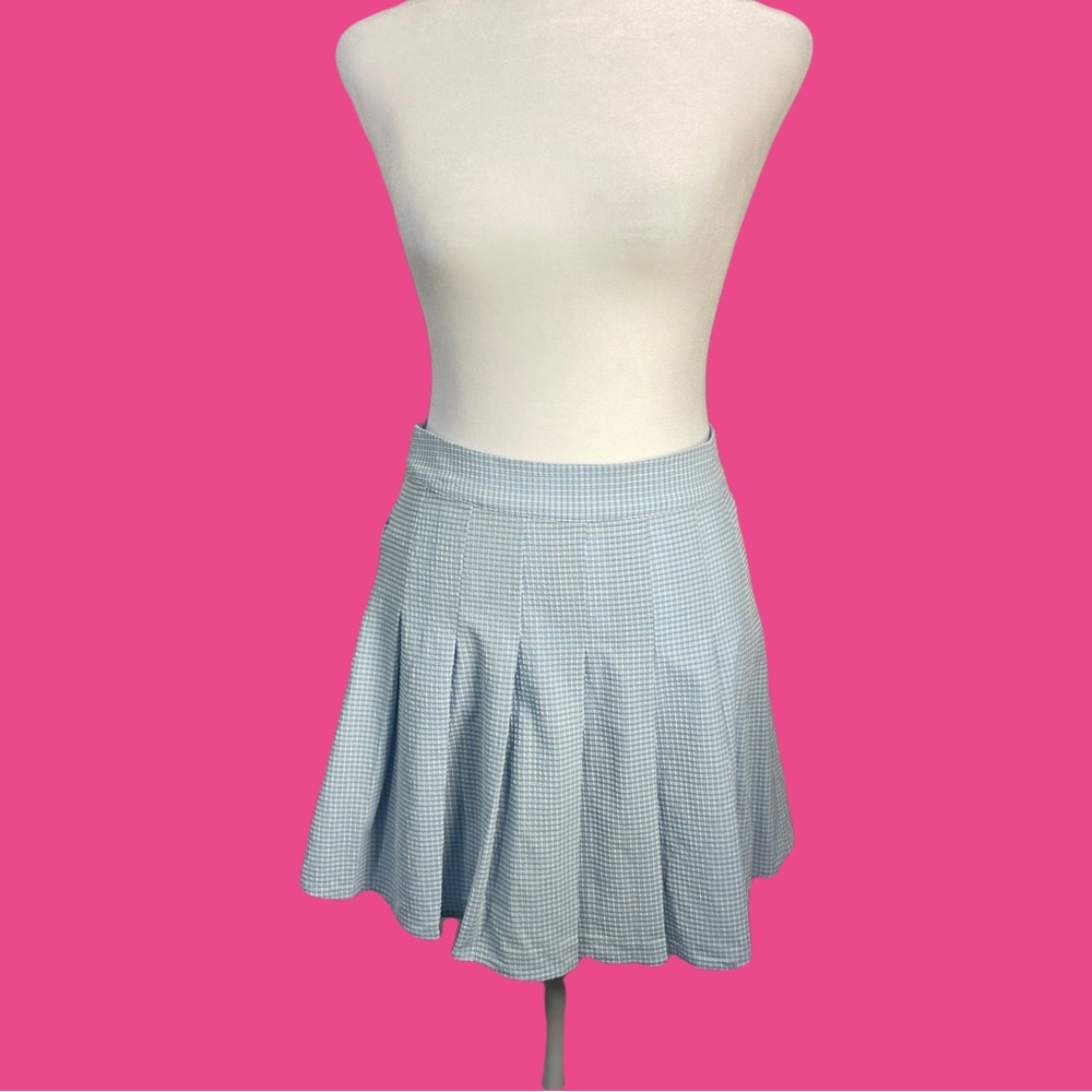 Baby blue pleated mini skirt with plaid print